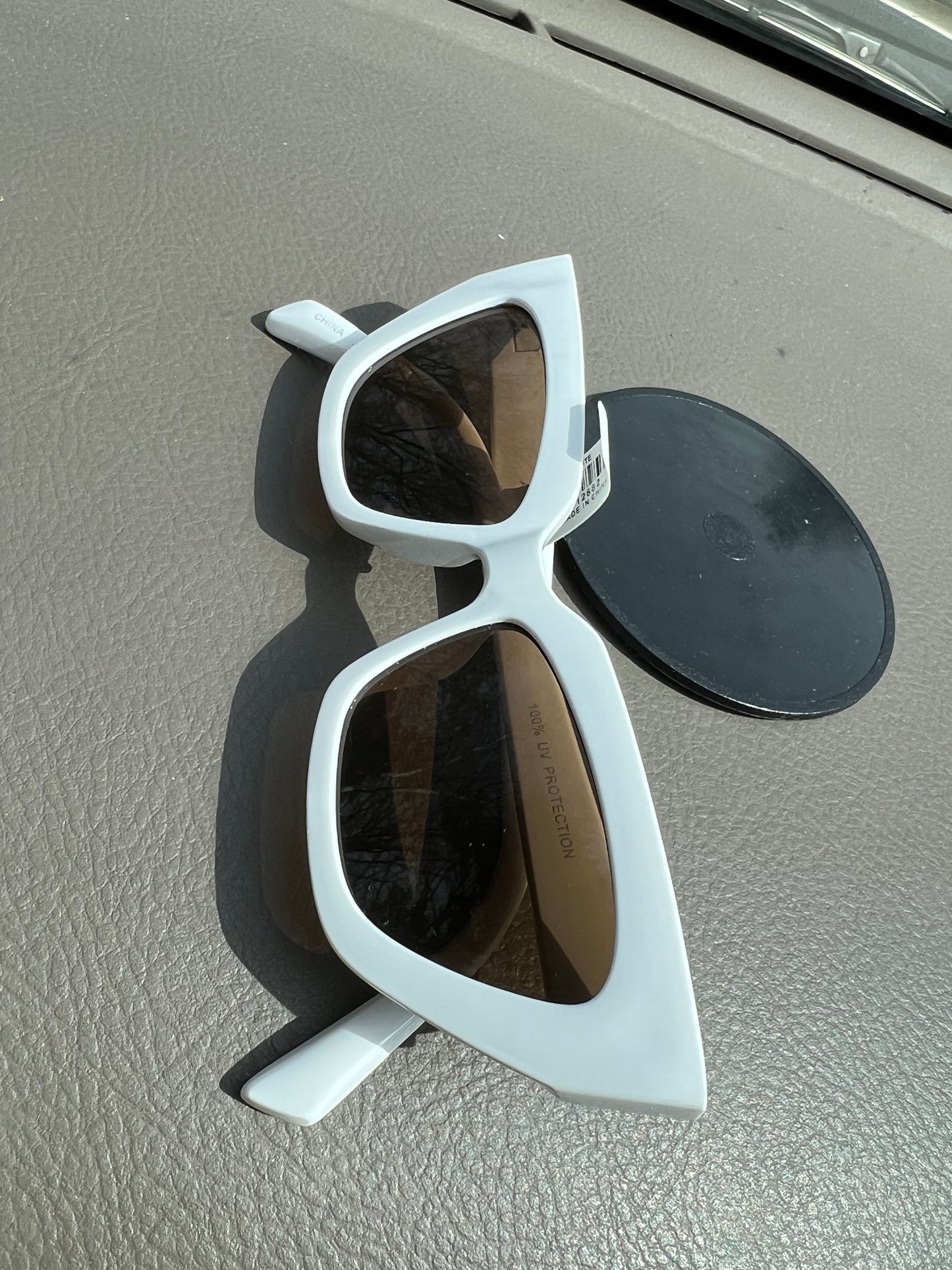 White Rimmed Sunglasses