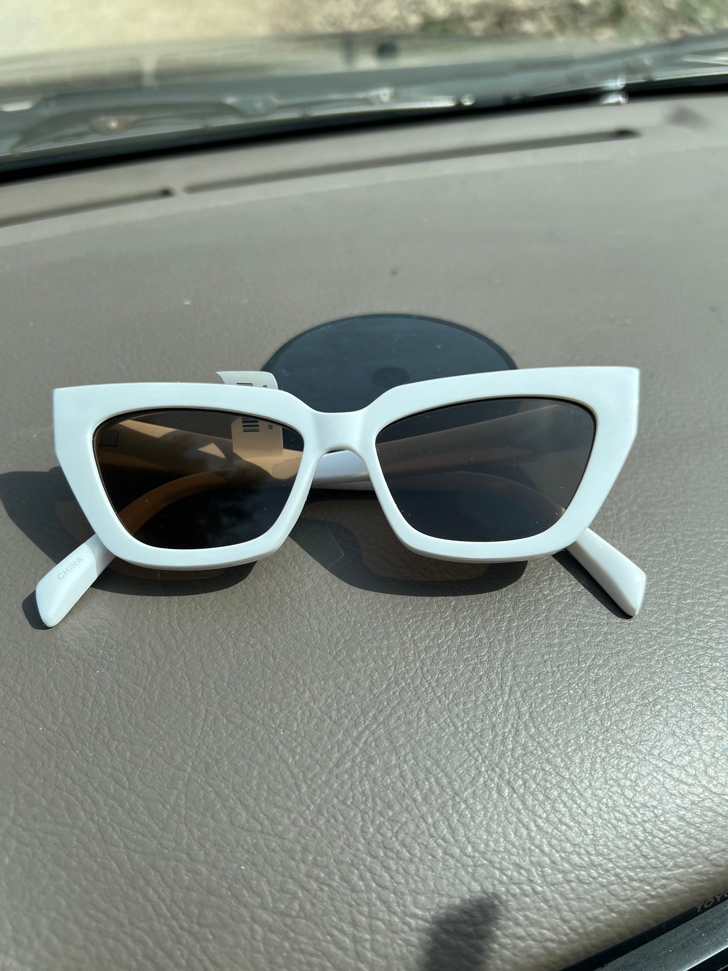 White Rimmed Sunglasses